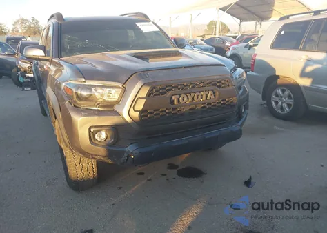 2021 Toyota Tacoma Trd Off-Road from USA, damaged, VIN 3TMCZ5AN4MM424715